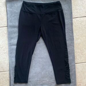 Reebok RBX women’s Black Capri Leggings with mesh cut out & lacing @ side